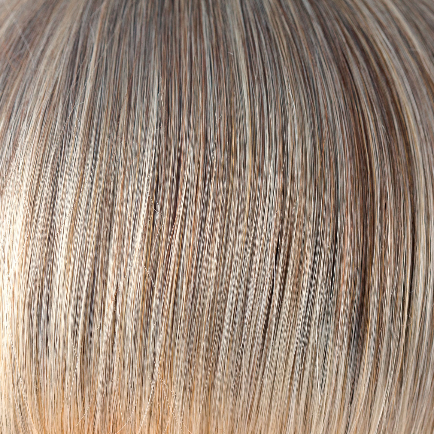 Frosti Blond - An ashy finely highlighted color, coming from a gentle root of dark blond. This is a very natural color, conservatively cool and sophisticated. Frosti Blond continues to wow us in any style!