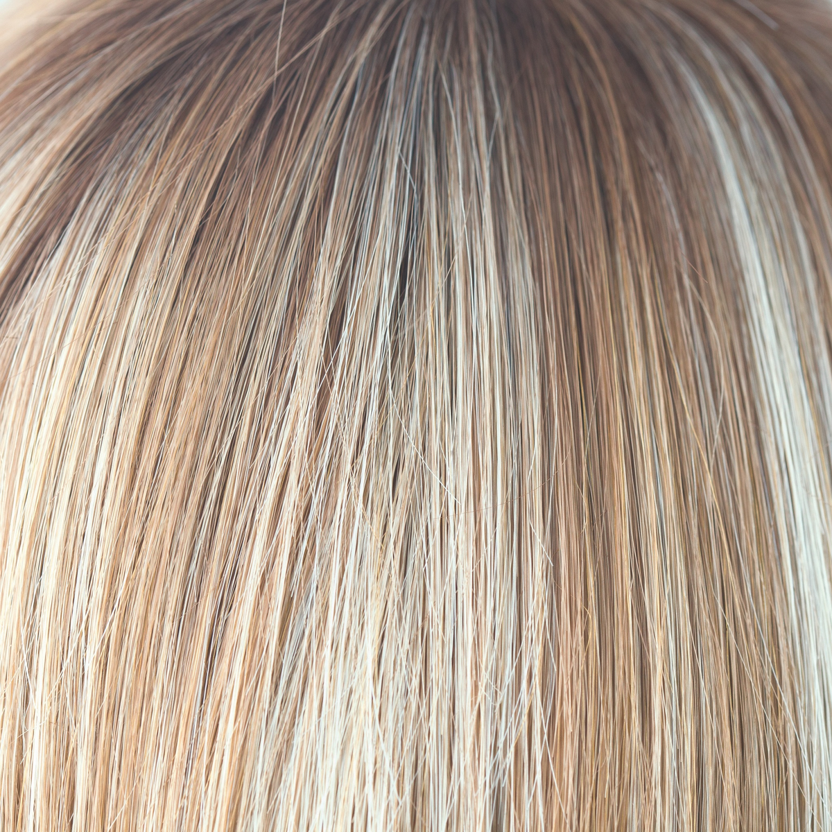 Nutmeg-R - This scrumptious rooted nutmeg blond with medium golden rooted base, blends into blond cream tones, warm coconut and honey slices. Nutmeg-R is classy and defined!