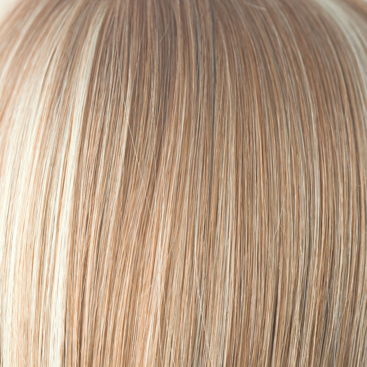 Strawberry Swirl - A combination of white blond highlights and rose gold. It is one of our lightest tones which has the prettiest of pinkish hues and a mix of our finest blond shades.