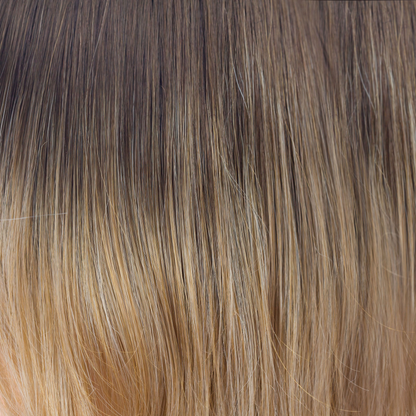 Banana Split-LR  -  A long chocolate root which blends into golden yellow slices with banana blonds running toward the ends. A flattering ombre that enriches your complexion.