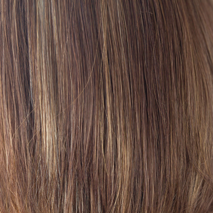 Coconut Spice  -  This medium red copper brown has a tasteful blend of lighter red and dark blonds. Coconut Spice has twists of pale coconut blonde shades throughout, spicing up this spectacular color. This continues to be a popular choice world over.