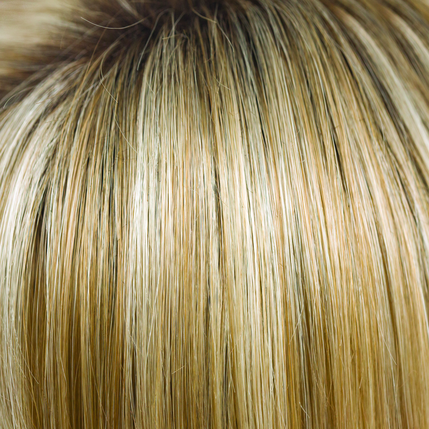 Creamy Toffee-R  -  This is the rooted version of Creamy Toffee. The color has undertones of coffee, gold honey tones and cream blond with a toffee twist gives the root a very natural regrowth charming and sophisticated.