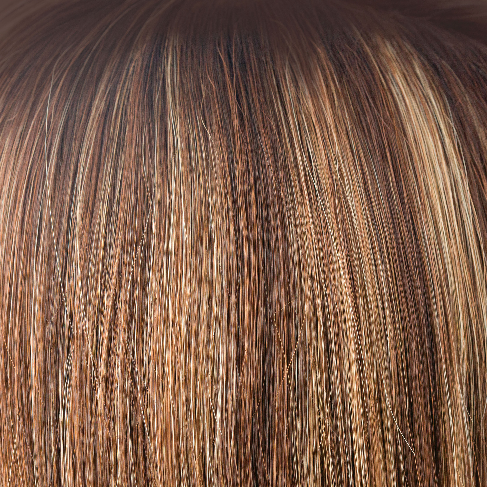 NM Auburn Sugar  -  A mixed red with a medium auburn brown base. The color is highlighted with a blend of golden and cherry blond with fine smoky blond slices and tones of copper.