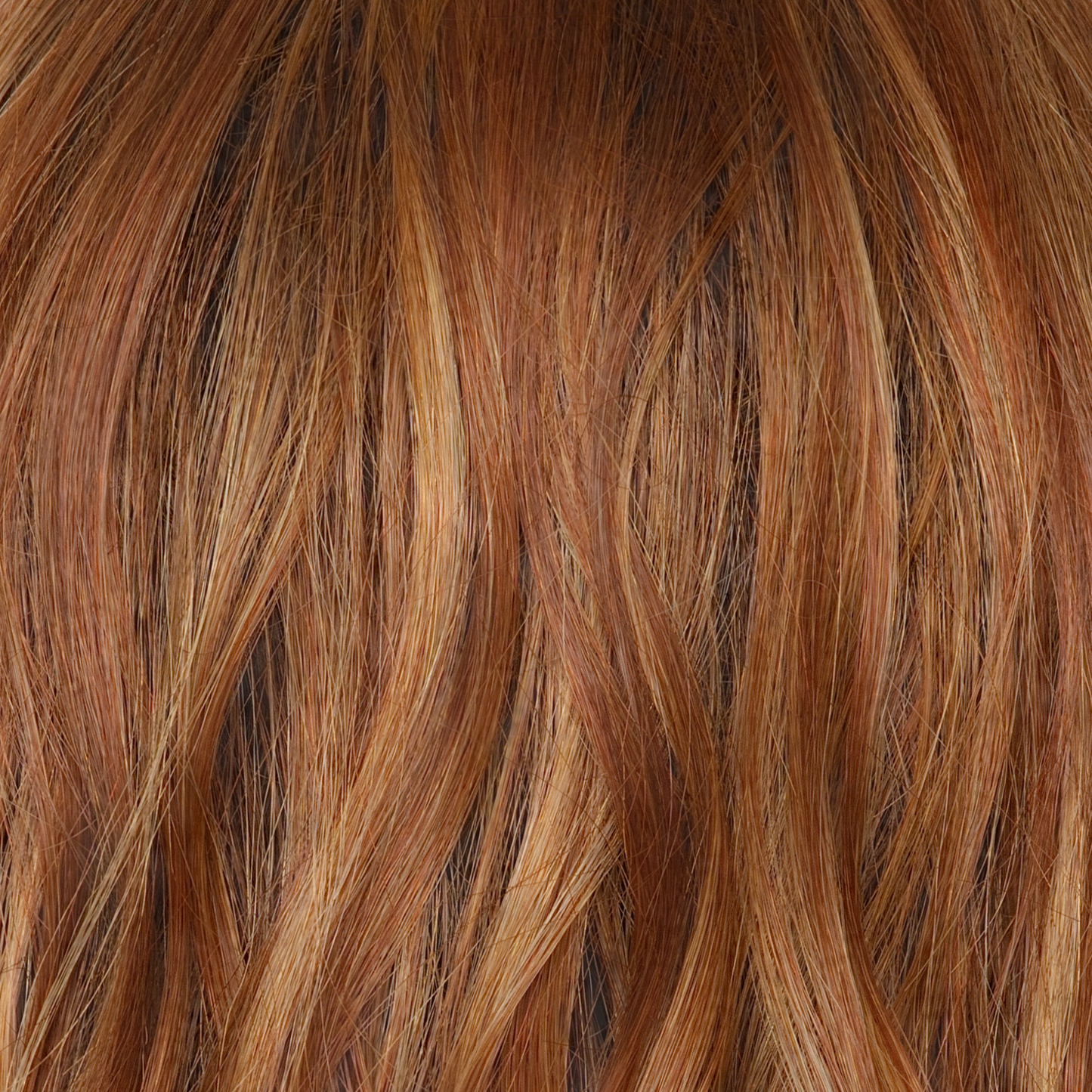 Rusty Sunrise-R - Merge of deep, earthy auburn tone with light copper blond highlights. The dark brown root offers a balance of depth and complements various skin tones.                 