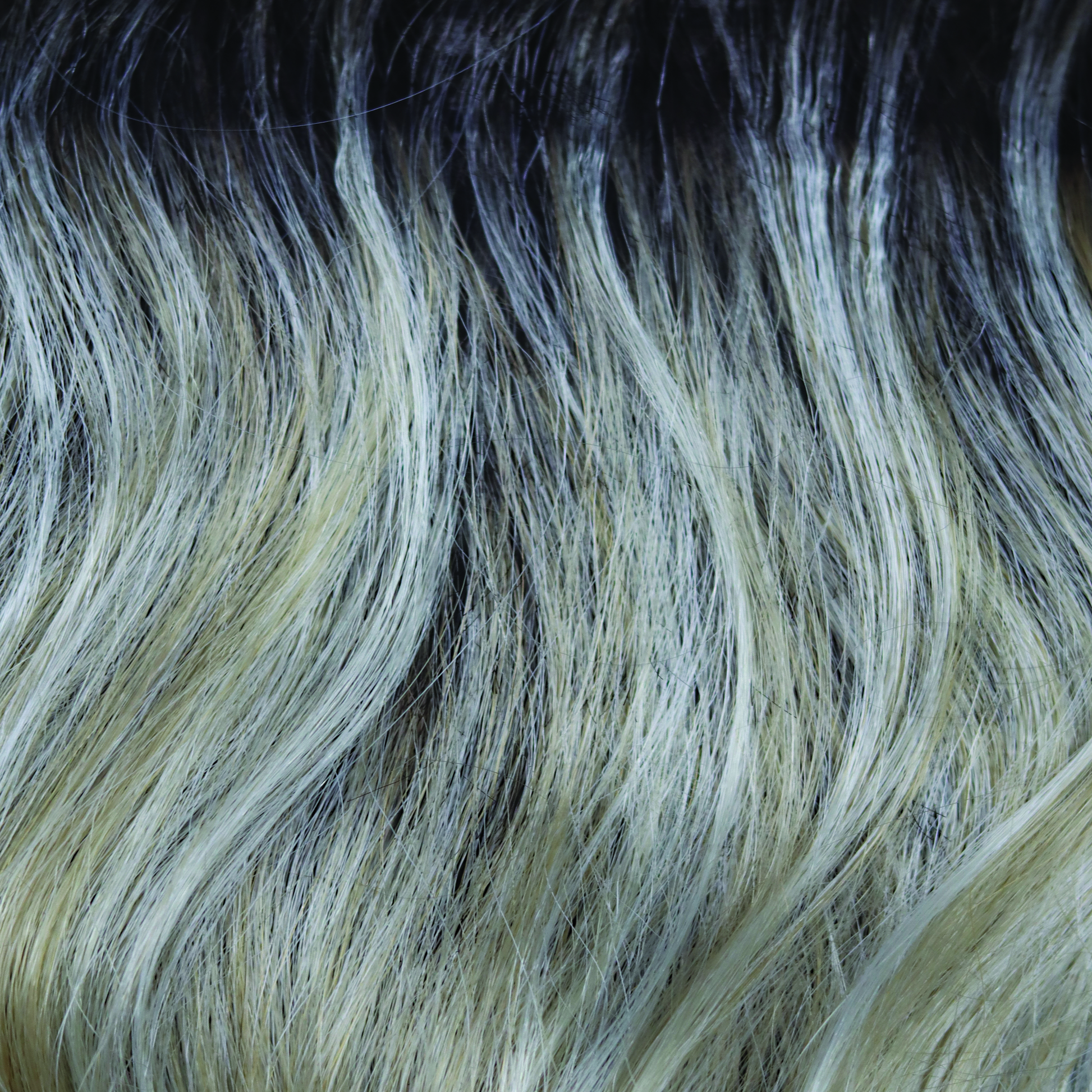 Shadowed Custard  -  This medium toffee rooted blond is packed full of weaves of custard cream slices and caramel undertones. 