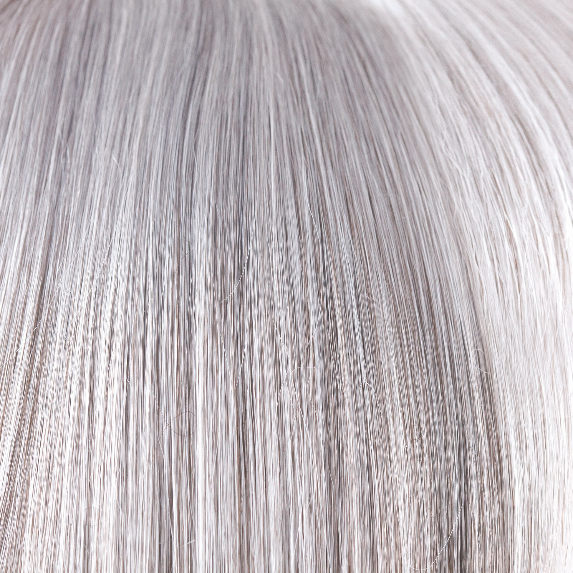 Silver Stone-R  -  A rooted version of our color Silver Stone. This color features a white silver tone front, silver and soft brown colors in middle, and dark brown mixed with silver nape.